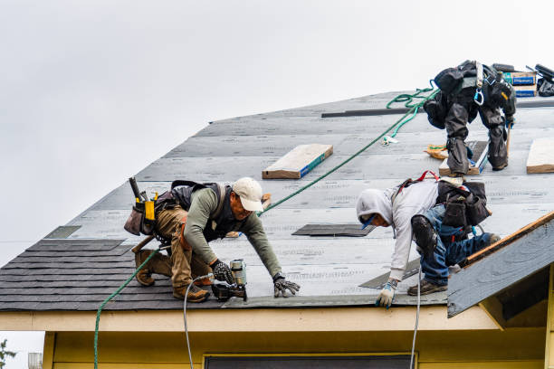 Professional Gutter Installation technician working in Retsil, WA